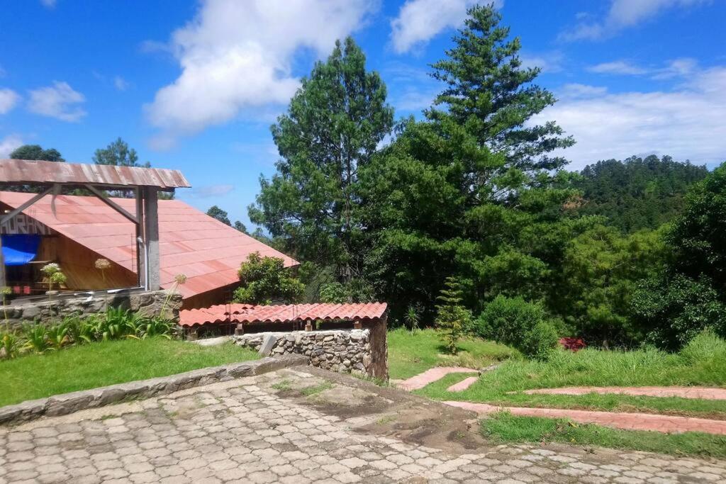 Cabana Con Banera Y Chimeneas En Puesta De Sol El Pacifico Exterior foto